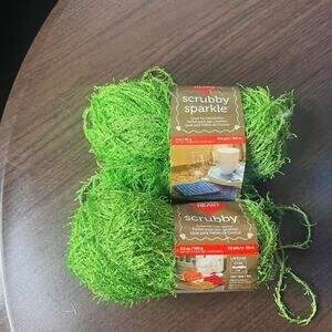 Bundle of green and scrubby Stripes Yarn